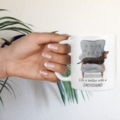 Life is better with a Black & Tan Dachshund dog mug (Illustrated collection) 17 Life is better with Black Tan Dachshund Designs hand holding plant
