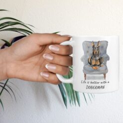 Life is better with a Doberman dog mug (Illustrated collection) 16 Life is better with Doberman Designs hand holding plant