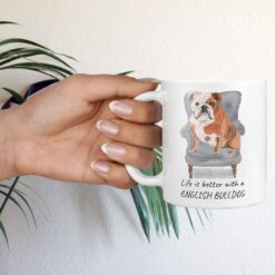 Life is better with English Bulldog Designs hand holding plant