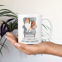 Life is better with Shetland Sheepdog Designs mug in hand plant