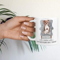 Life is better with a Staffordshire Bull Terrier dog mug (Illustrated collection) 16 Life is better with Staffordshire Bull Terrier Designs hand holding plant