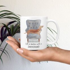 Life is better with Tan Dachshund Designs mug in hand plant