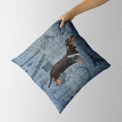 Adventure is out there cushion Black Tan Dachshund Faded Ephemera Denim holding in hand