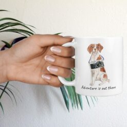Adventure is out there Brittany dog mug (Illustrated collection) 17 adventure is out there dog mug brittany hand holding plant