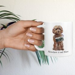 adventure is out there dog mug brown cockapoo hand holding plant
