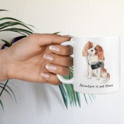 Adventure is out there Cavalier King Charles Spaniel dog mug (Illustrated collection) 17 adventure is out there dog mug cavalier king charles spaniel hand holding plant
