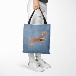 Tan Dachshund Dog Denim Style Tote Bag 40 denim dogs tote tan dachshund gently faded denim tote woman trowsers walking view