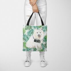 travel dogs tote japanese spitz leaves tote woman trowsers front view