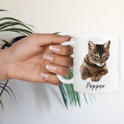 personalised pet portrait mug cat illustration hand holding plant