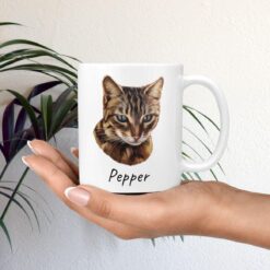 personalised pet portrait mug cat painting mug in hand plant