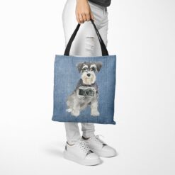 denim dogs tote miniature schnauzer gently faded denim tote woman trowsers walking view
