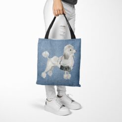 White poodle Dog Denim Style Tote Bag 53 denim dogs tote white poodle gently faded denim tote woman trowsers walking view
