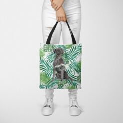 travel dogs tote black lab leaves tote woman trowsers front view