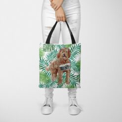 travel dogs tote labradoodle leaves tote woman trowsers front view