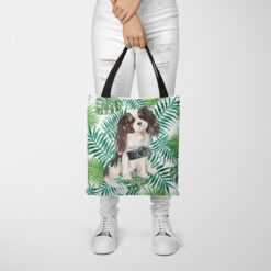 travel dogs tote tri colour king charles spaniel leaves tote woman trowsers front view
