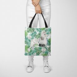 travel dogs tote white poodle leaves tote woman trowsers front view